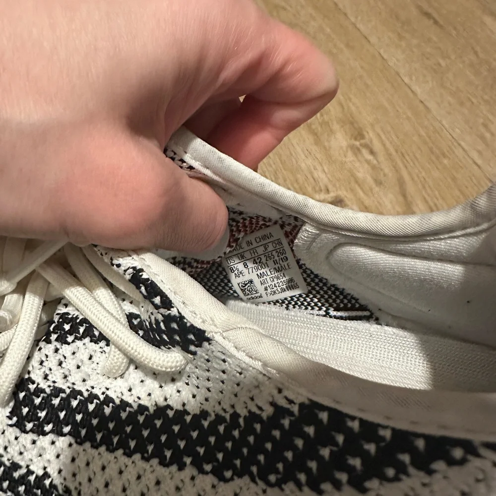 Yeezy Black and White Sneakers - Picture 2 of 3